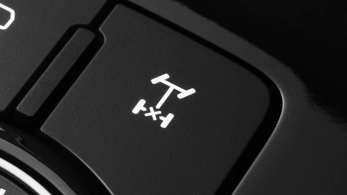 A close-up of the Isuzu MU-X 4x4's rear differential lock button, a key feature for maintaining traction during off-road towing.