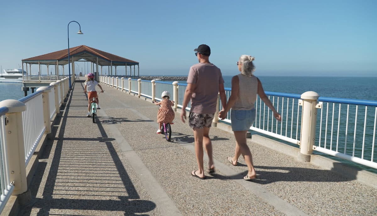 Walking down the a pier in Scarborough Qld