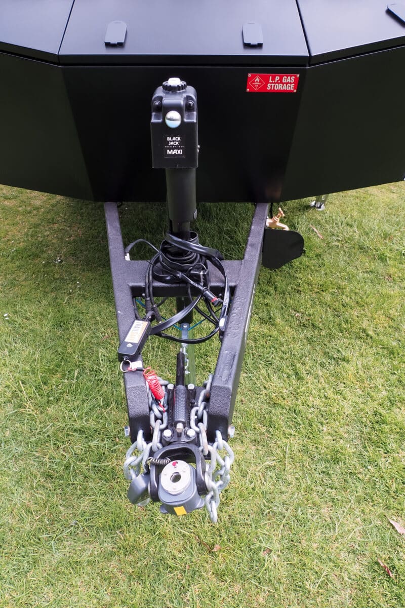 An birds eye view of the Cruisemaster DO35 Hitchmaster Coupling and Black Jack Maxi Electric Jack fitted to a coated a-frame