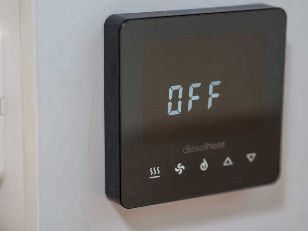 A close up of a digital Dieselheat control panel