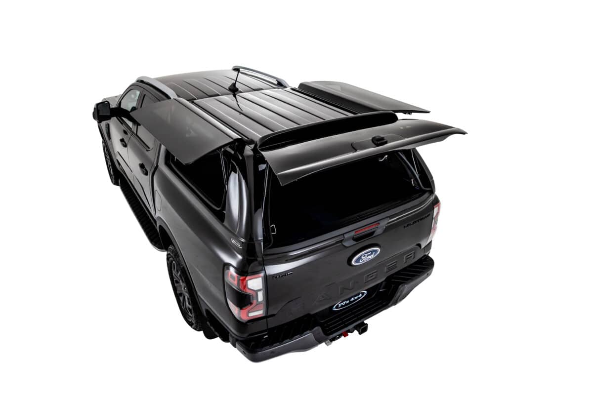 Aerial shot of a PJs 4X4 canopy with all three doors open/. Note how it follows your vehicle's roofline
 
