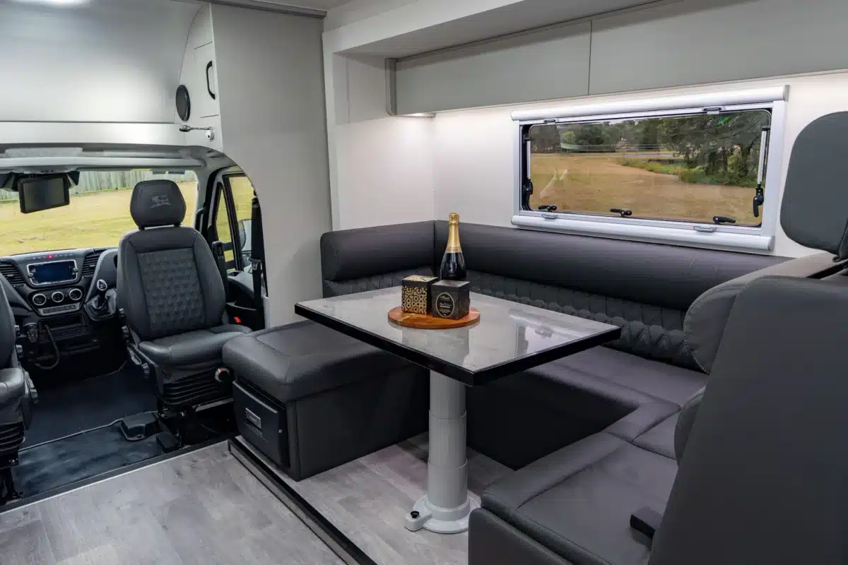Lounge and dinette area inside the Paradise Independence Platinum motorhome