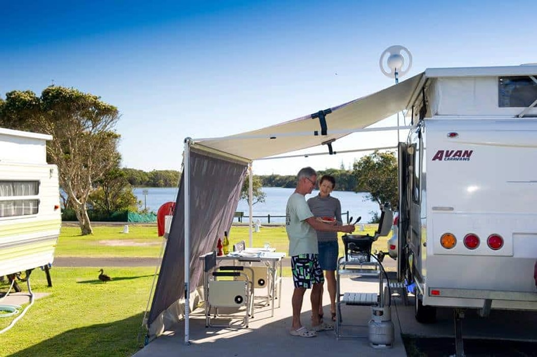 Couple enjoying a short caravan getaway at an Australian holiday park