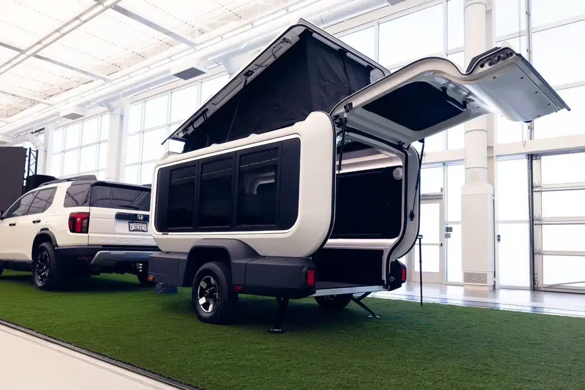 Honda Base Station travel trailer prototype with rear tailgate open and pop-up roof raised