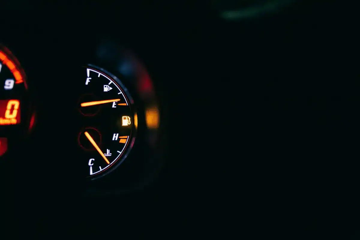dark car dash withfuel light on